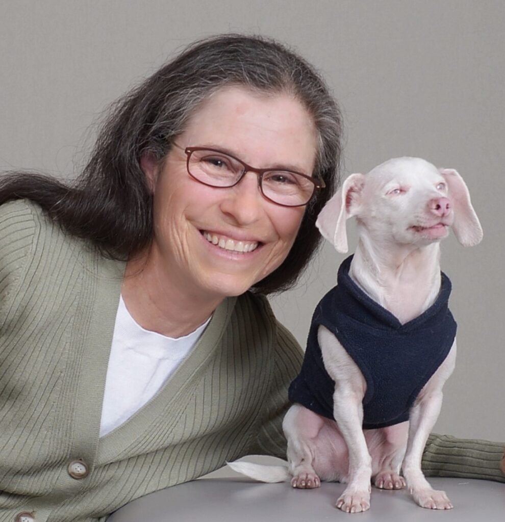 Dr. Melissa with piglet