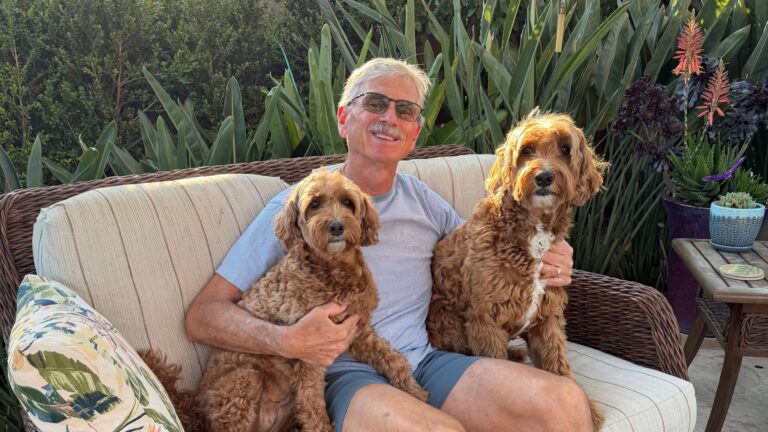 Jim at home with Mango and Abby